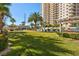 Expansive green space with palm trees and lush landscaping offers a serene and inviting atmosphere at 8255 One Las Vegas Blvd # 504, Las Vegas, NV 89123
