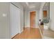 Hallway features wood floors, a decorative mirror, and modern finishes at 8255 One Las Vegas Blvd # 504, Las Vegas, NV 89123