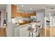 Bright open kitchen boasts stainless steel appliances, granite countertops, and breakfast bar seating at 8255 One Las Vegas Blvd # 504, Las Vegas, NV 89123