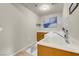 Bright laundry room with modern appliances, storage cabinets, and a utility sink at 8255 One Las Vegas Blvd # 504, Las Vegas, NV 89123