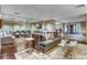 Inviting lounge with elegant seating, decorative rugs, and glass enclosed office space at 8255 One Las Vegas Blvd # 504, Las Vegas, NV 89123