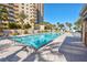 Luxurious pool area with palm trees, comfortable lounge chairs, and city views, perfect for relaxation and entertainment at 8255 One Las Vegas Blvd # 504, Las Vegas, NV 89123