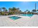 Inviting pool and hot tub with palm trees and ample deck space at 8255 One Las Vegas Blvd # 504, Las Vegas, NV 89123