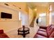 Inviting entryway with staircase and tile flooring leading to the living areas at 8370 Lost Lake Ct, Las Vegas, NV 89147
