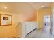 Hallway featuring white built-in cabinets and wood-look flooring at 8370 Lost Lake Ct, Las Vegas, NV 89147