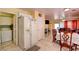 Open concept kitchen area with a refrigerator and adjacent breakfast nook at 8370 Lost Lake Ct, Las Vegas, NV 89147