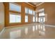 Open foyer with high ceilings, large windows and tile flooring, offering an abundance of natural light at 9923 Sierra Canyon Way, Las Vegas, NV 89147