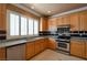 Kitchen featuring stainless steel appliances and stone countertops is the heart of the home at 9923 Sierra Canyon Way, Las Vegas, NV 89147