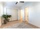 Bright bedroom with light flooring and large closet, offering ample storage space and a minimalist aesthetic at 10002 Trapper Mountain St, Las Vegas, NV 89178