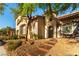 Beautiful single-Gathering home with manicured desert landscaping and inviting curb appeal at 10002 Trapper Mountain St, Las Vegas, NV 89178