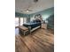 Bedroom with blue walls, fan, bench, and bed at 1198 Golf Club, Laughlin, NV 89029