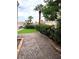 Well-manicured front yard with vibrant landscaping and palm trees at 1198 Golf Club, Laughlin, NV 89029