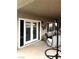 Outdoor patio features a hanging chair and direct access into the home at 1198 Golf Club, Laughlin, NV 89029