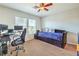 Bedroom featuring carpet flooring, natural light, ceiling fan, and neutral colored walls at 1213 High Altitude Ave, North Las Vegas, NV 89032