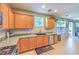 Spacious kitchen featuring granite countertops, stainless steel appliances, and ample cabinet space at 1213 High Altitude Ave, North Las Vegas, NV 89032