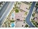 Aerial view of a luxury home, pool, and outdoor patio in an upscale neighborhood at 12168 Dorada Coast Ave, Las Vegas, NV 89138