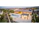 Aerial view of landscaped backyard with pool, hot tub, and pergola at 12168 Dorada Coast Ave, Las Vegas, NV 89138