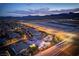Overhead shot of a neighborhood near the mountains showing a home with a pool and outdoor patio at 12168 Dorada Coast Ave, Las Vegas, NV 89138