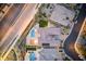 Stunning aerial view of a luxury home featuring a pool, spa, and beautifully landscaped backyard at 12168 Dorada Coast Ave, Las Vegas, NV 89138