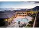 Backyard features a pool, spa, pergola and an outdoor seating area at 12168 Dorada Coast Ave, Las Vegas, NV 89138
