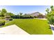 A well-maintained artificial turf lawn perfect for Gathering fun and outdoor activities at 12168 Dorada Coast Ave, Las Vegas, NV 89138