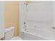 Clean bathroom showcasing a tiled shower and bathtub combination with polished chrome fixtures at 12168 Dorada Coast Ave, Las Vegas, NV 89138