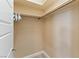 Walk-in closet with shelves and hanging rods at 12168 Dorada Coast Ave, Las Vegas, NV 89138