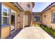 Charming front entrance with stone accents and a welcoming pathway, enhancing the home's curb appeal at 12168 Dorada Coast Ave, Las Vegas, NV 89138