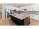 Gourmet kitchen with stainless steel appliances, granite countertops, and custom cabinetry at 12168 Dorada Coast Ave, Las Vegas, NV 89138