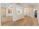 Bright and airy living room with elegant hardwood floors and sophisticated architectural details at 12168 Dorada Coast Ave, Las Vegas, NV 89138