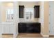 Mudroom with dark cabinets and white shuttered windows; a sink is visible in the adjoining room at 12168 Dorada Coast Ave, Las Vegas, NV 89138