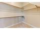 Walk-in closet with built in shelving and hanging rods, offering ample storage space at 12168 Dorada Coast Ave, Las Vegas, NV 89138