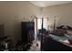 Bedroom with natural light, a bed, and neutral paint at 1409 Velvet Leaf Dr, North Las Vegas, NV 89032