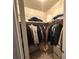 Walk-in closet with clothing racks and shelving for ample storage at 1409 Velvet Leaf Dr, North Las Vegas, NV 89032