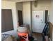 House entrance with a locked security door and textured walls at 1409 Velvet Leaf Dr, North Las Vegas, NV 89032