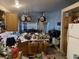 Open kitchen view includes a breakfast bar, oak cabinets, and lots of clutter at 1409 Velvet Leaf Dr, North Las Vegas, NV 89032