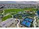Beautiful aerial view showcasing the community park with basketball and pickleball courts at 1467 Melodic Lark Ln, Las Vegas, NV 89138