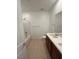 Bathroom with modern fixtures, vanity, and tiled floor at 1467 Melodic Lark Ln, Las Vegas, NV 89138