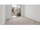 Unfurnished bedroom with carpeted floors and sliding glass doors to a balcony at 1467 Melodic Lark Ln, Las Vegas, NV 89138