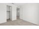 Empty bedroom shows a closet, open door and carpeted floors at 1467 Melodic Lark Ln, Las Vegas, NV 89138
