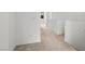 A carpeted hallway shows a walkway between rooms in a house at 1467 Melodic Lark Ln, Las Vegas, NV 89138
