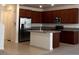 Modern kitchen with stainless steel appliances and center island at 1467 Melodic Lark Ln, Las Vegas, NV 89138