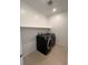 Laundry room with side by side washer and dryer and shelf at 1467 Melodic Lark Ln, Las Vegas, NV 89138