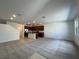 Open-concept living room and kitchen featuring modern finishes at 1467 Melodic Lark Ln, Las Vegas, NV 89138