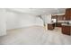 Expansive living space with open kitchen layout, granite countertops, and stainless appliances at 1467 Melodic Lark Ln, Las Vegas, NV 89138