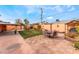 Spacious backyard featuring a patio, a dining table, and green area perfect for entertaining at 147 Cervantes St, Las Vegas, NV 89101