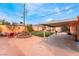Expansive backyard with various seating areas, mature trees, and ample space at 147 Cervantes St, Las Vegas, NV 89101