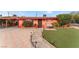 Inviting home showcasing a stone pathway, artificial turf, and covered entryway at 147 Cervantes St, Las Vegas, NV 89101
