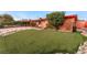 Charming home featuring an inviting front yard, with a well-manicured lawn and lovely landscaping at 147 Cervantes St, Las Vegas, NV 89101
