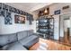 Comfortable living room featuring a gray sofa and an entertainment center at 147 Cervantes St, Las Vegas, NV 89101